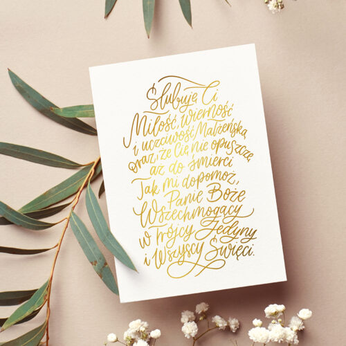 Wedding invitation card mockup with natural eucalyptus and white gypsophila twigs. Blank card mockup on beige background.