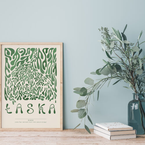 Modern interior close up with Eucalyptus in green vase, books an