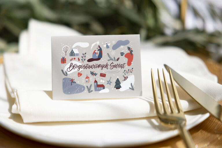 Name card mockup on plate with gold cutlery on olive branch back